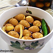 Raw Quail Eggs in Sauce