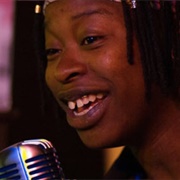 Elsa Eli Waithe (Non-Binary, They/Them)