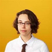 Janine Brito (Lesbian, She/Her)