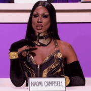 Shea Couleé as Naomi Campbell