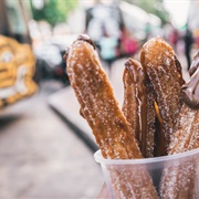 Eat Churros in Spain