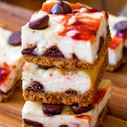 Strawberry Swirl Chocolate Chip Cheesecake Bars