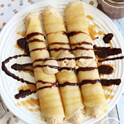 Salted Caramel Crepes With Biscoff Cheesecake Filling  and Caramel Sauce