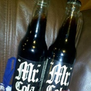 "Mr". Cola