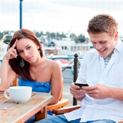 Using Your Phone While Talking to Someone