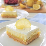 Lemon Sour Cream Cheesecake Bars With Lemon Oreo Crust