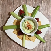 Green Hummus With Crackers, Celery and Strawberries