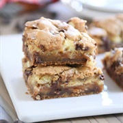 Caramel Cheesecake Stuffed Chocolate Chip Cookie Bars
