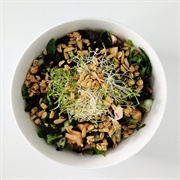 Tomato Cucumber and Seaweed Salad With Nuts and Sprouts