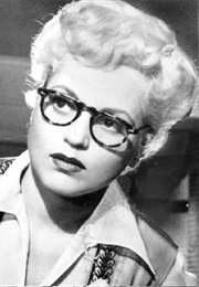 Judy Holliday as Billie Dawn (Born Yesterday) (1950)