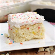 White Chocolate Funfetti Poke Cake