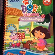 Dora the Explorer: Dora's Got a Puppy (V.Smile Smart Book)