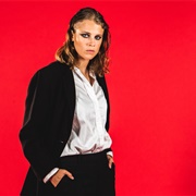 MARIKA HACKMAN (Lesbian, She/Her)