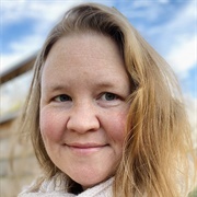 Anita Kelly (Non-Binary, They/Them)