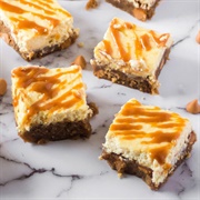 Butterscotch Blondies With Eggnog Cheesecake Topping