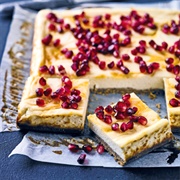Baked Orange & Pomegranate Cheesecake Bars