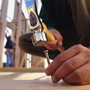 Hammer Hitting a Nail