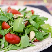 Arugula and Baby Spinach Salad With Tomatoes, Cashews and Sunflower Seeds