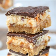 Butterfinger Nutter Butter Cheesecake Bars