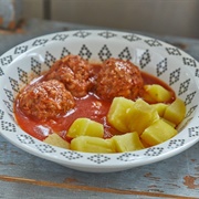 Meatballs and Boiled Potatoes in Tomato Sauce