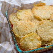 Scalloped Potatoes With Onions, Tomatoes, Anchovies, Herbs and Garlic