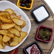 Potato Wedges With Olives and Tomato Dip