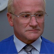 Sy Parrish (One Hour Photo, 2002)