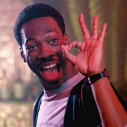 Eddie Murphy as Det. Axel Foley (Beverly Hills Cop, 1984)