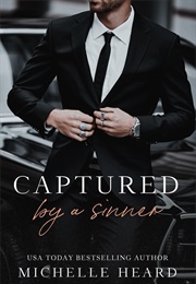 Captured by a Sinner (Michelle Heard)