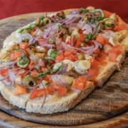 Bruschetta With Tomato, Olives, Onions and Basil