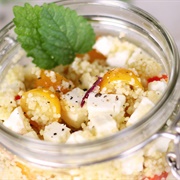 Couscous Salad With Tomatoes and Vegan Cheese