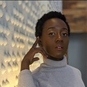 Temídayo Amay (Non-Binary/Genderqueer, They/Them)