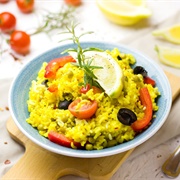 Vegetable Paella With Tomato, Bell Pepper, Olives, Peas and Rosemary