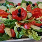 Bell Pepper Tomato and Cucumber Salad With Black Olives