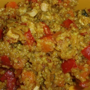 Vegan Curry Millet Pilaw With Vegetables, Dates, Cashew Nuts and Pumpkin Seeds