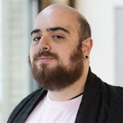 George Abraham (Non-Binary, They/Them)