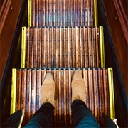 Ridden on a Wooden Escalator