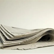 Looked Up a Movie Time in the Newspaper