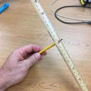 Spinning a Ruler With a Pencil
