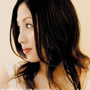 パズル (Puzzle) Round Table Featuring Nino