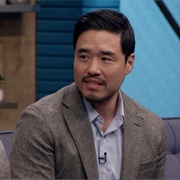 28. Randall Park Wears Brown Dress Shoes With Blue Socks