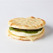 Egg White, Pesto, and Swiss Cheese Naan Sandwich