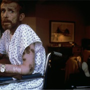 Ken Meeks, Patient With AIDS, Being Cared for by a Friend, San Francisco, California (1986)