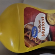 Yellow Mustard Wiht a Fork