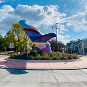 Whimsical Metal Sculptures on Palms and Marco Place