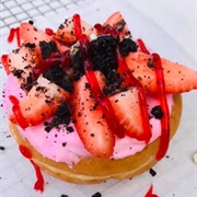 Tory&#39;s Donuts &amp; Pastries Fresh Strawberry Oreo Strawberry Glaze Donut
