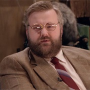 34. Robert Kirkman Wears a Tan Blazer and Red Suit Pants