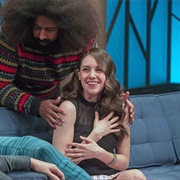 9. Alison Brie Wears a Black Mesh Top & Mini-Skirt