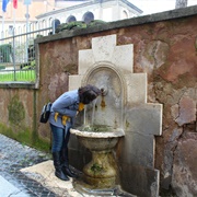 Drink Cool Water From an Outdoor Fountain on a Warm Day