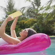 Reading on Pool Float